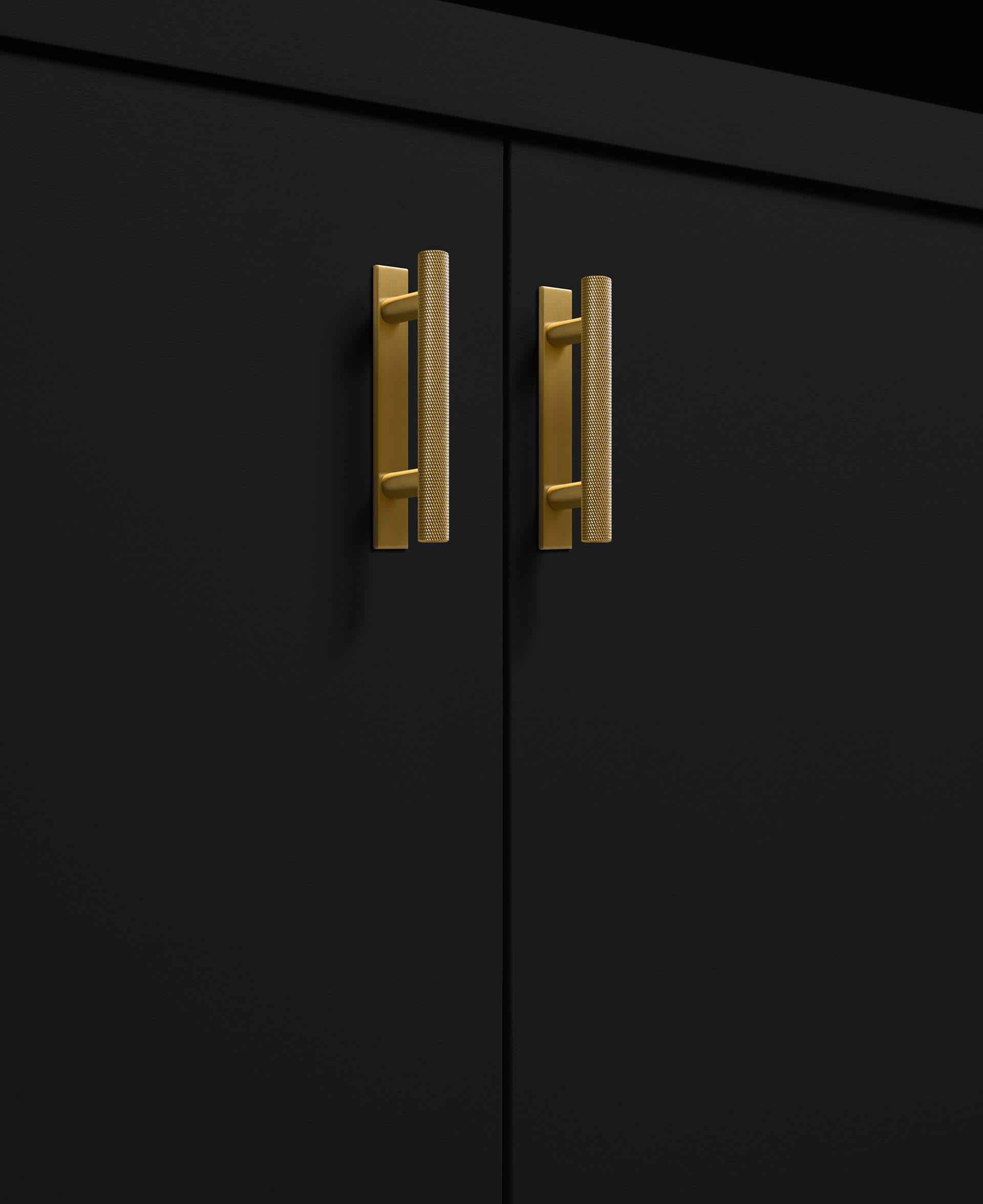 close up of gold handles in the kitchen