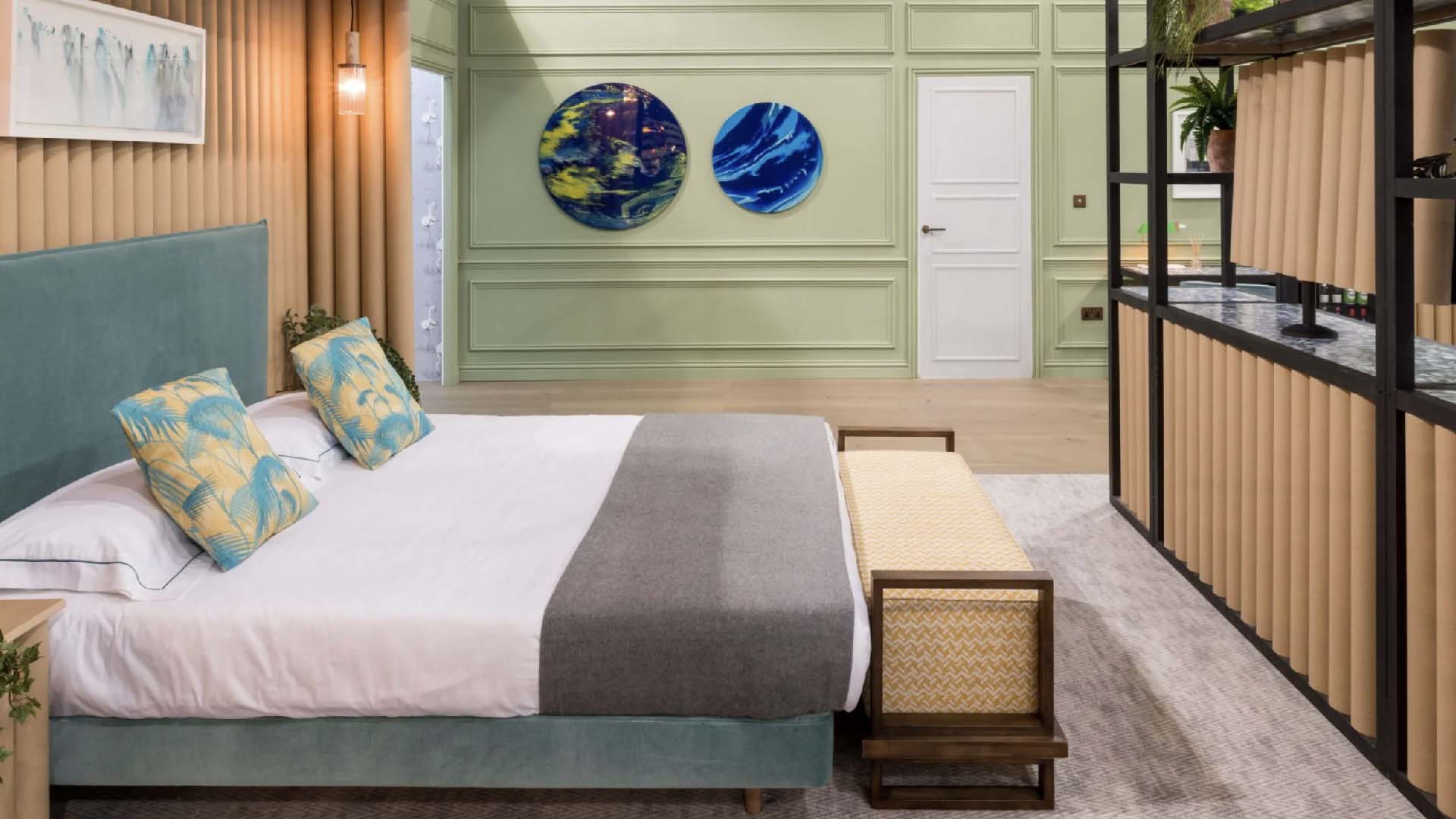 Bed positioned in front of a TV