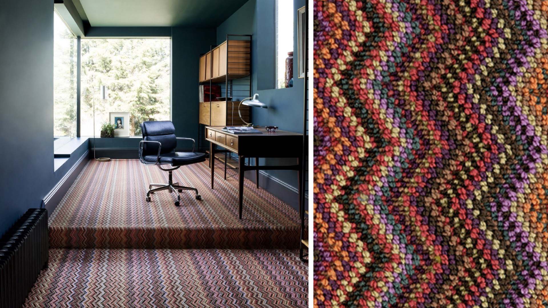 colourful office with a colourful carpet and a large window at the end