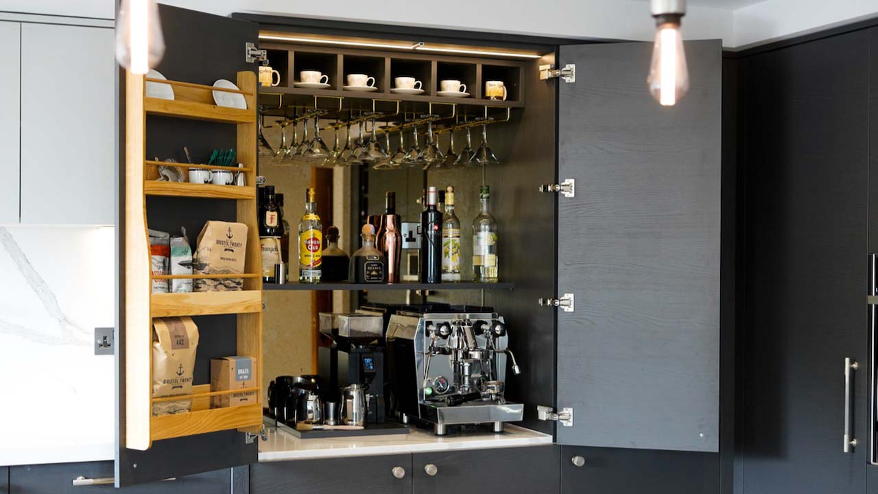 half height cupboard with everything you need for coffee and cocktails