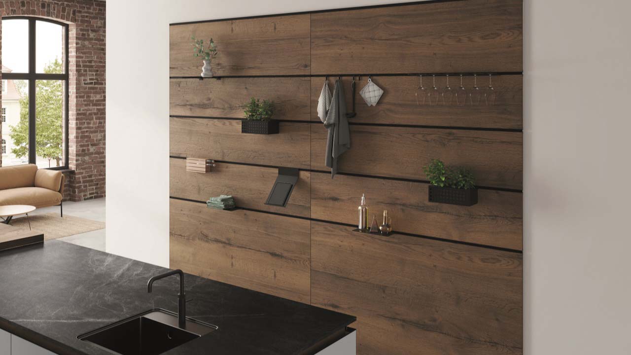 hanging kitchen items on a wall to save space