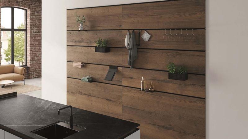 hanging kitchen items on a wall to save space