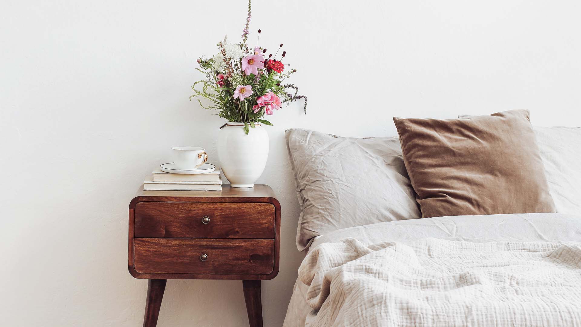 Bedside table with flowers