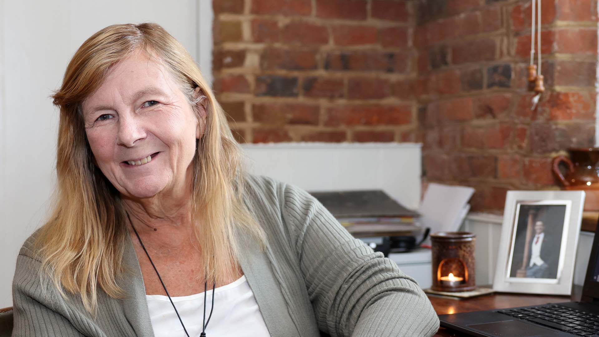 Jan Cavelle smiling at the camera