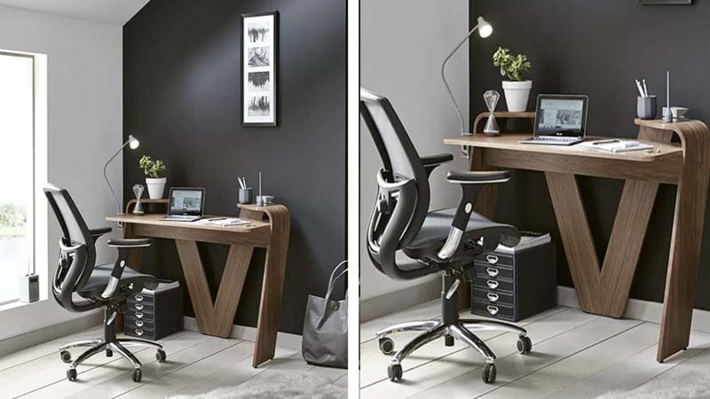 wooden desk by a floor to ceiling window and black paint