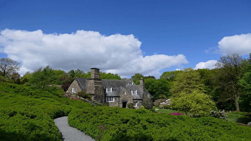 Stoneywell cottage, an Arts and Crafts home, is nestled into a hilly garden