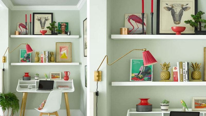 red wall light shining over the desk