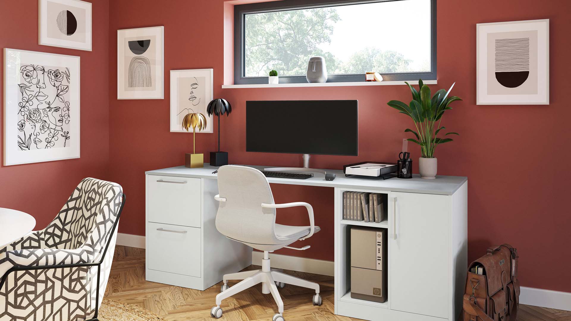 Beautifully organised desk against a terracotta wall