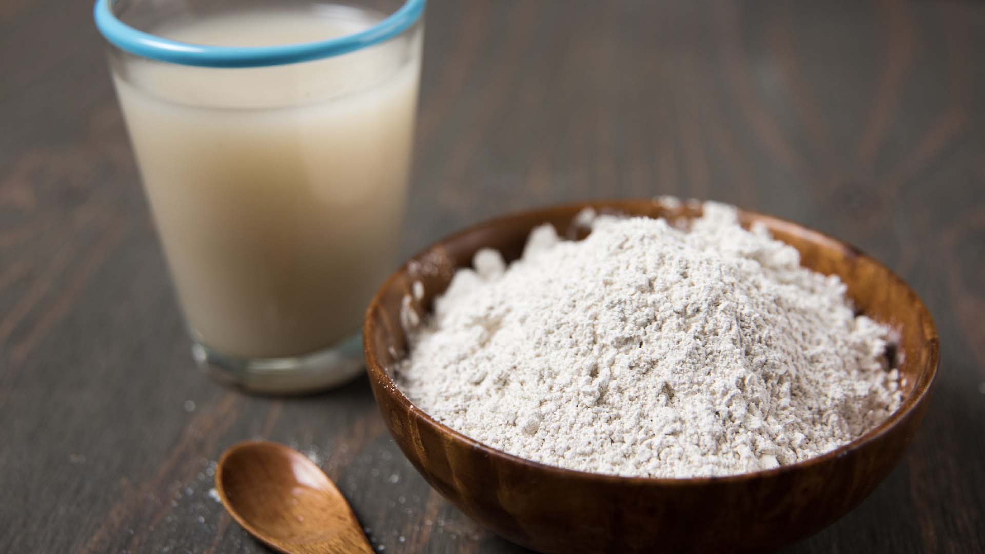 A wooden bowl filled with ground diatomaceous earth
