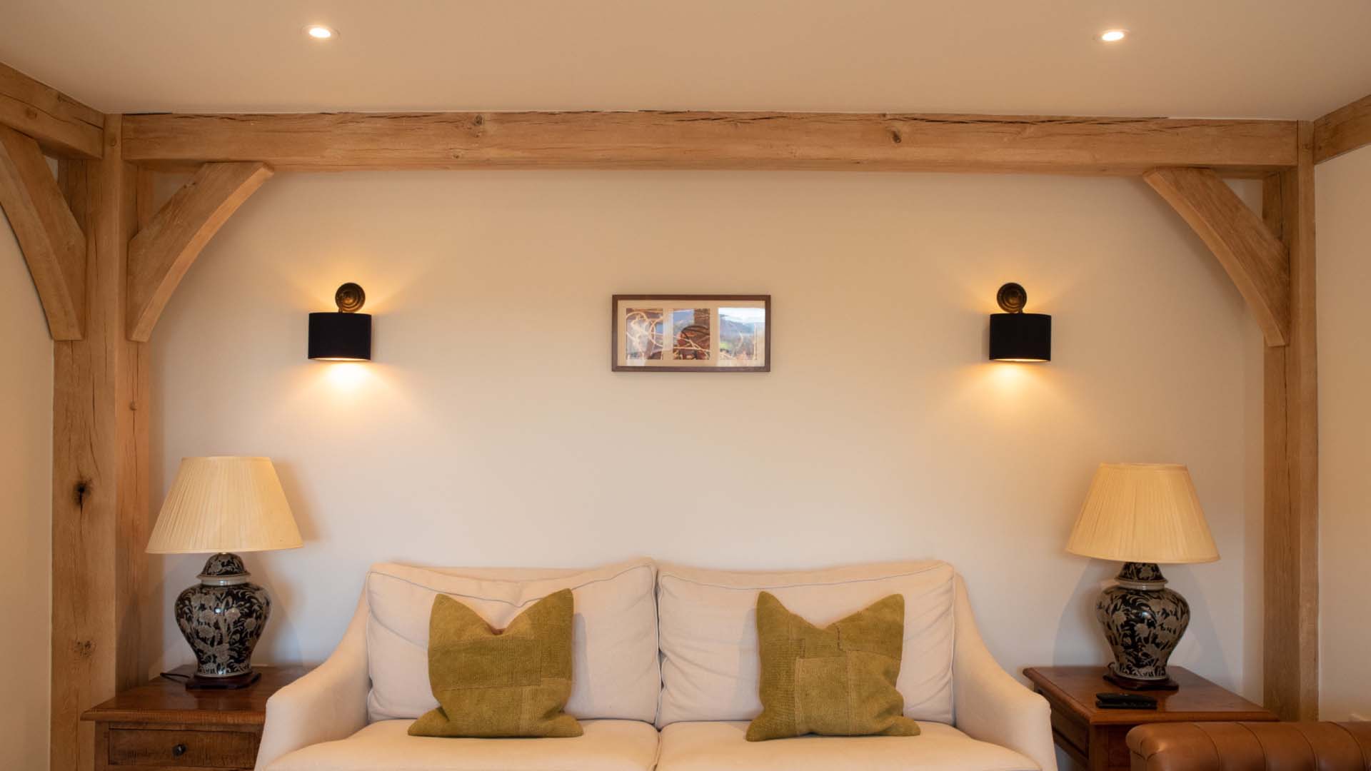 Living room with wood beams and spot lights