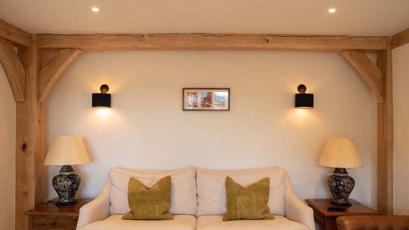 Living room with wood beams and spot lights