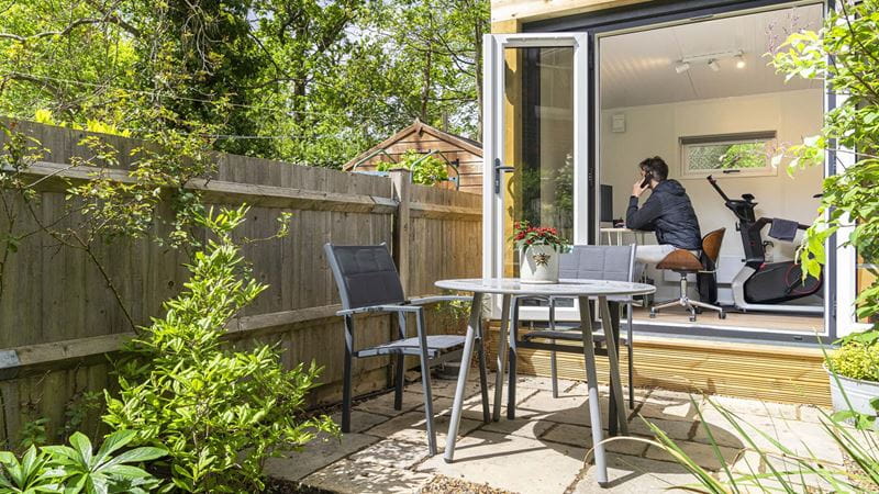 A garden room with large windows