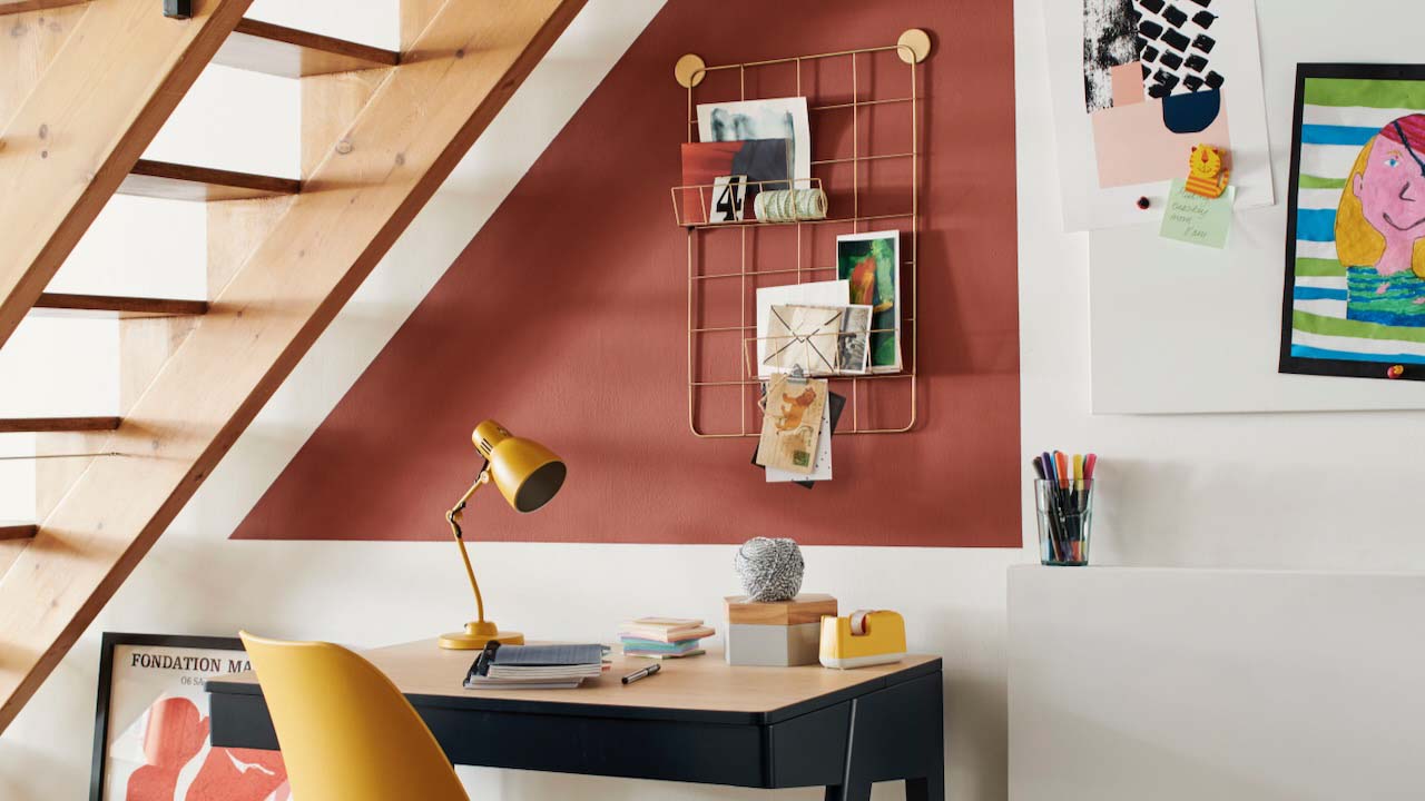 small desk under the stairs