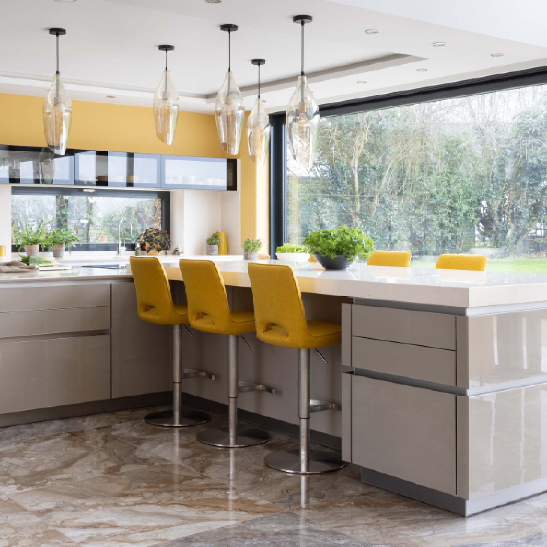 kitchen with bifolding doors and yellow walls