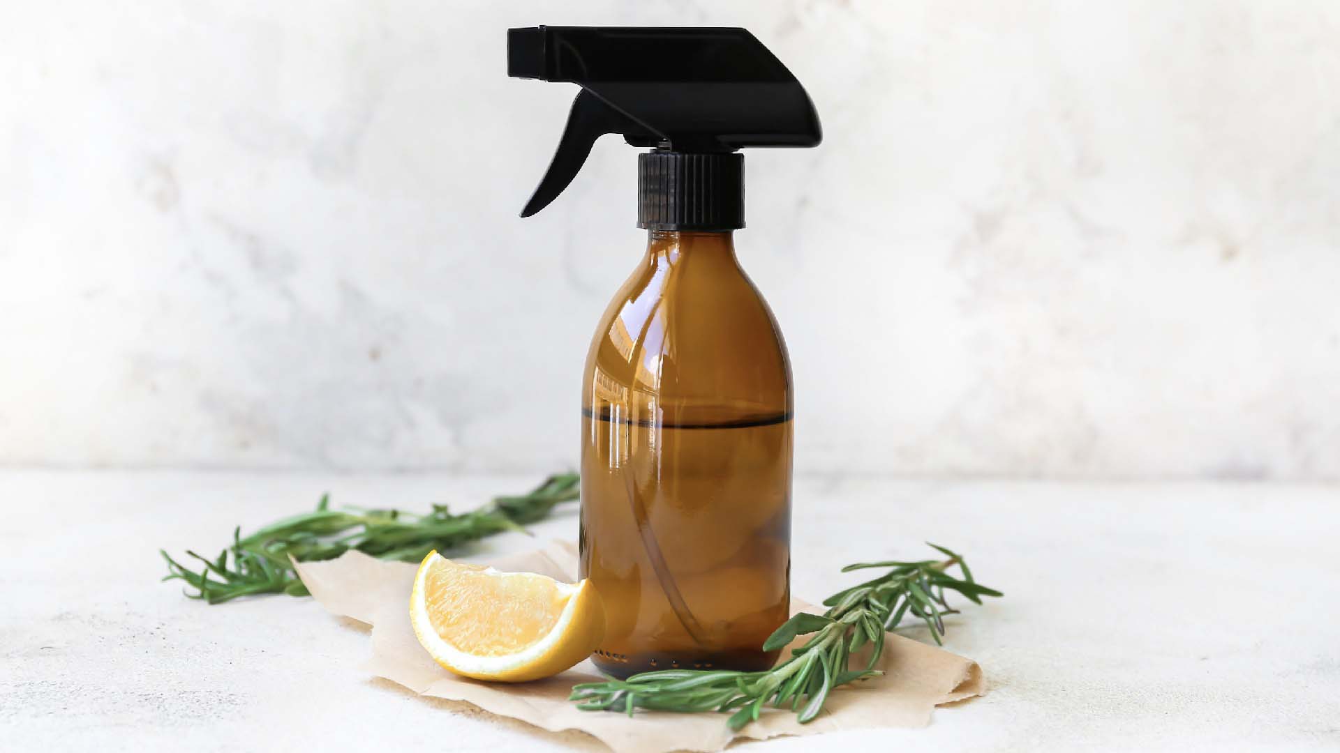 A spray bottle filled with lemon infused water
