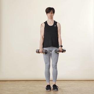 showing how to use dumbbells for exercise