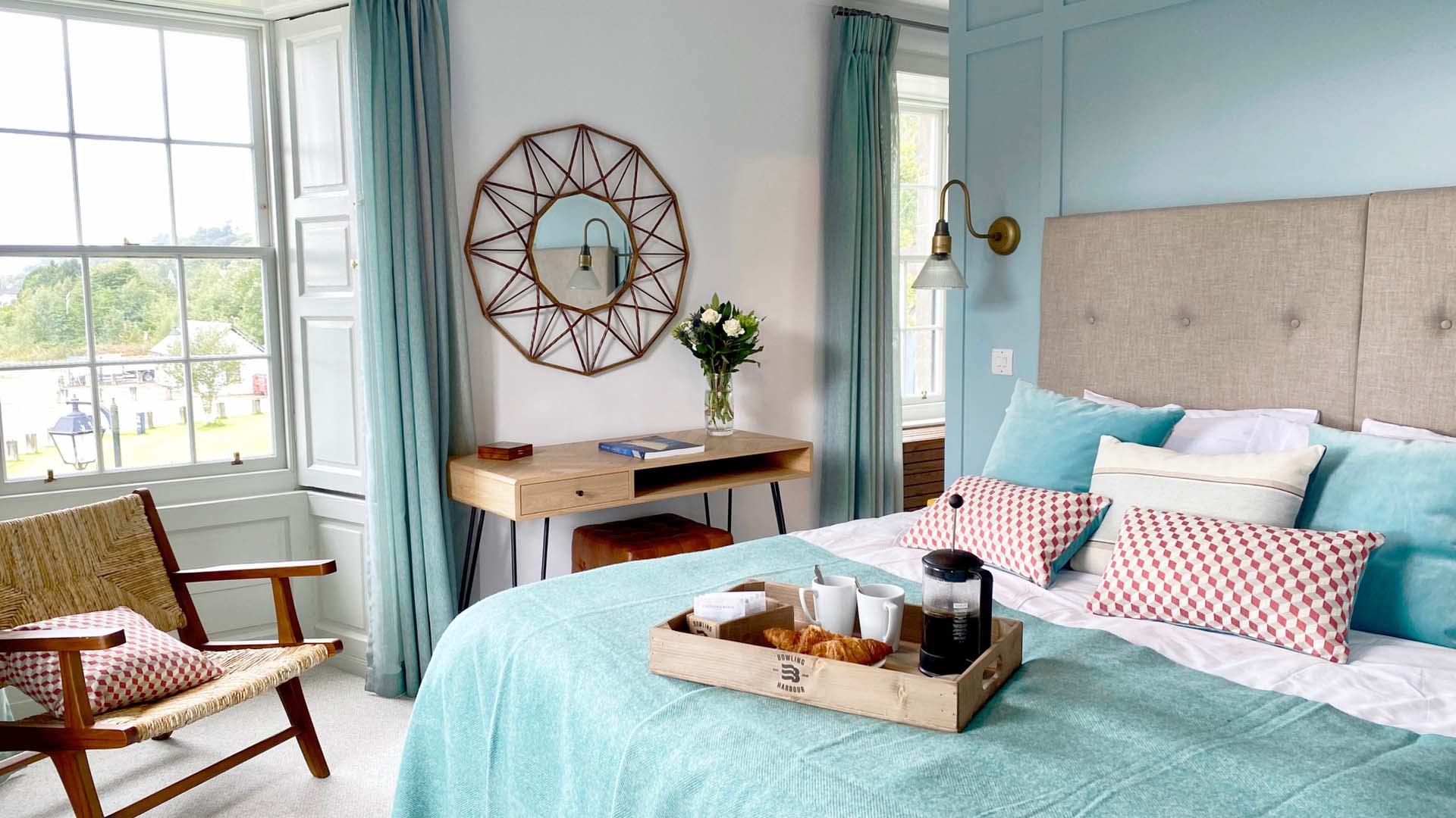 a bedroom with office setup