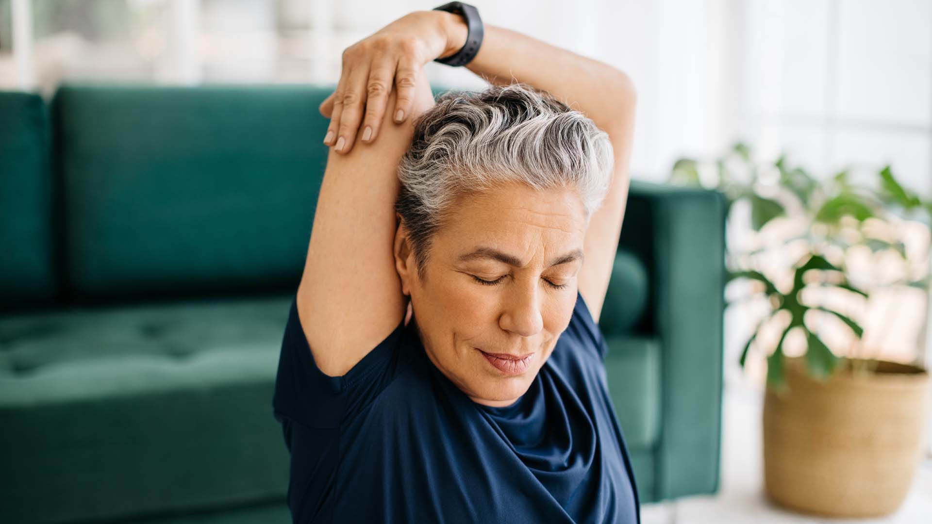 Woman stretching her triceps