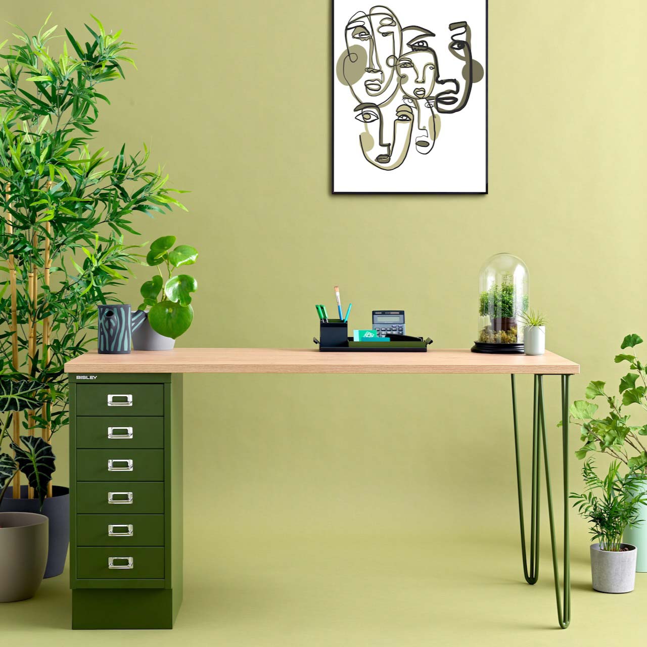 green office with a sleek natural desk setup 