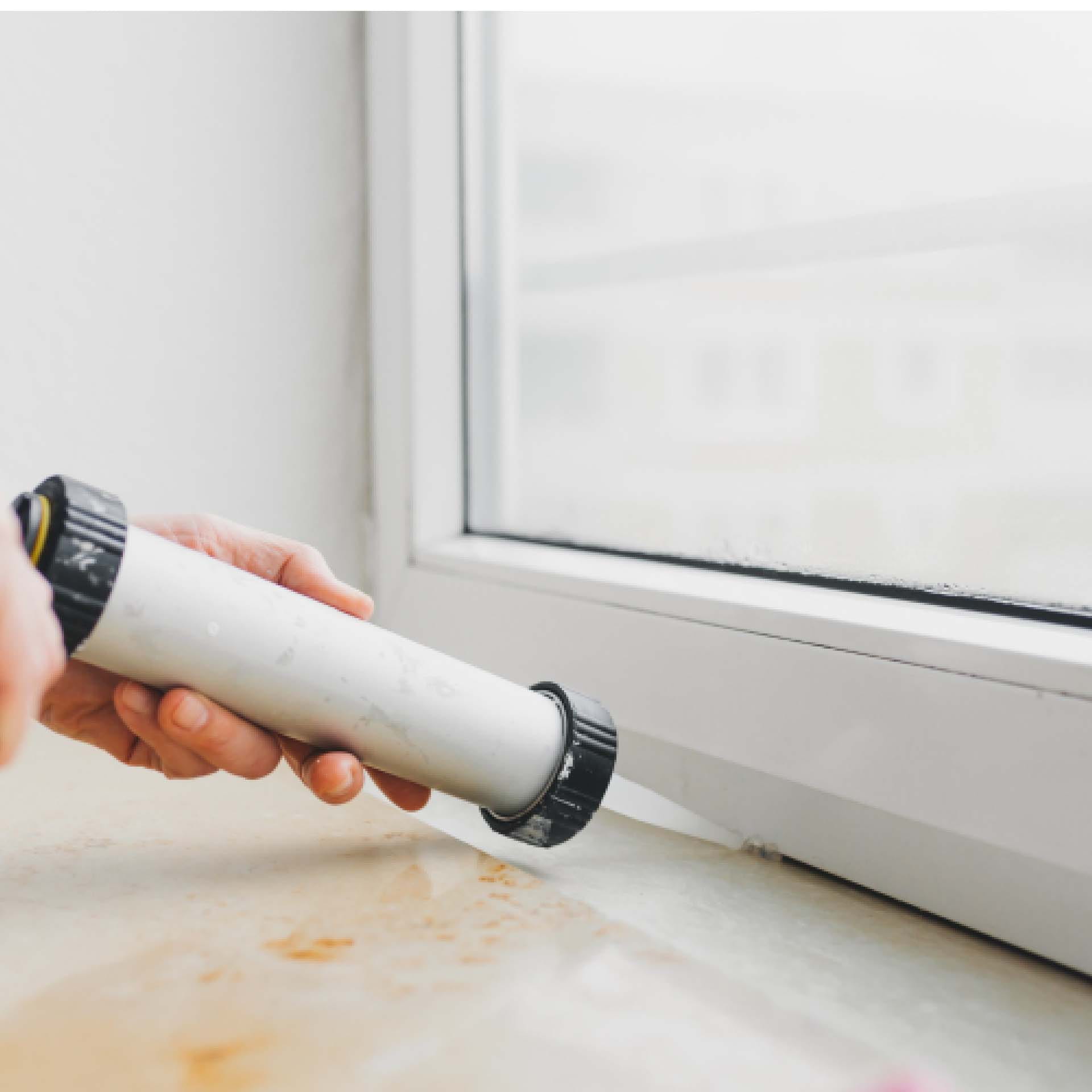 using caulk along the window to draught proof it
