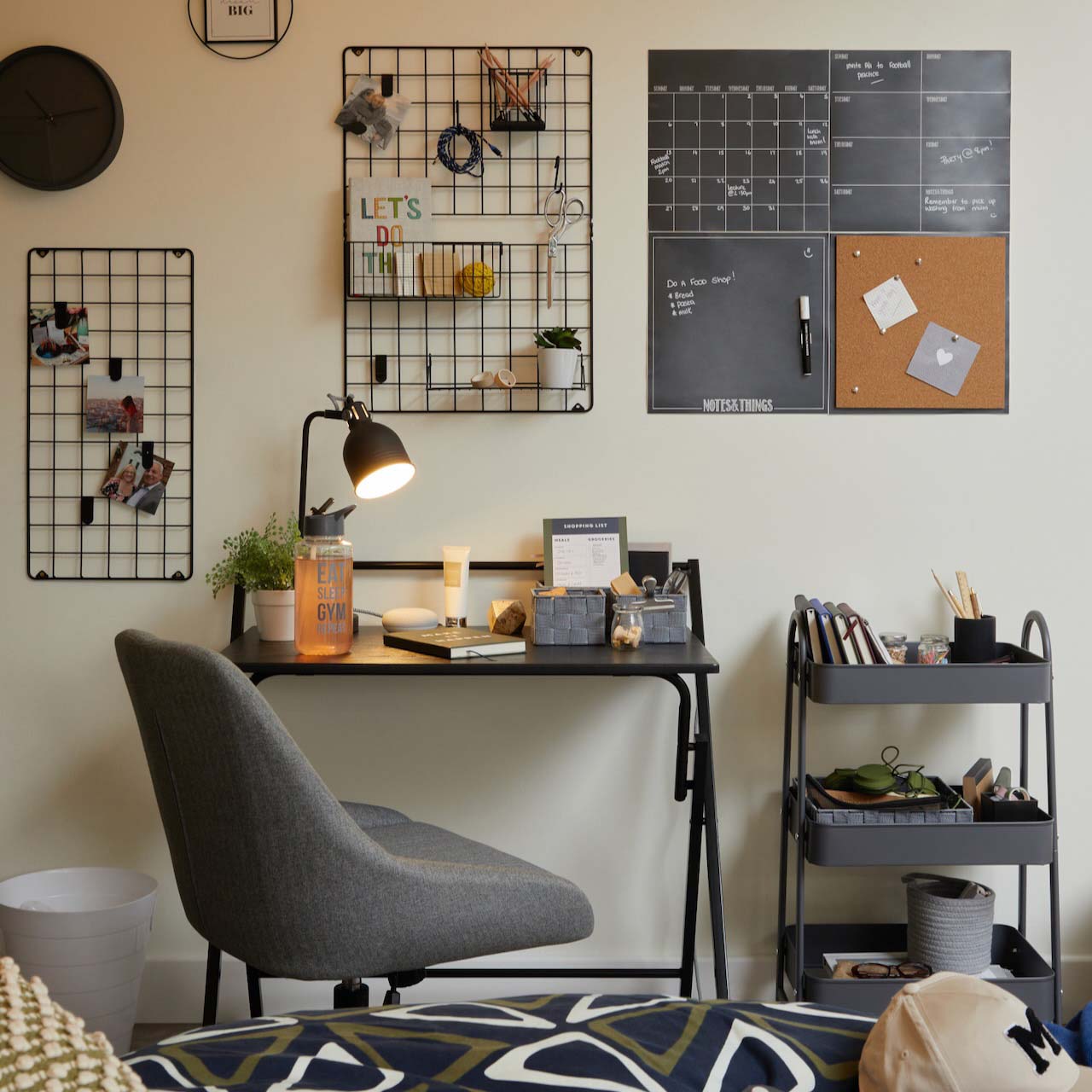 a desk with rolling storage next to it