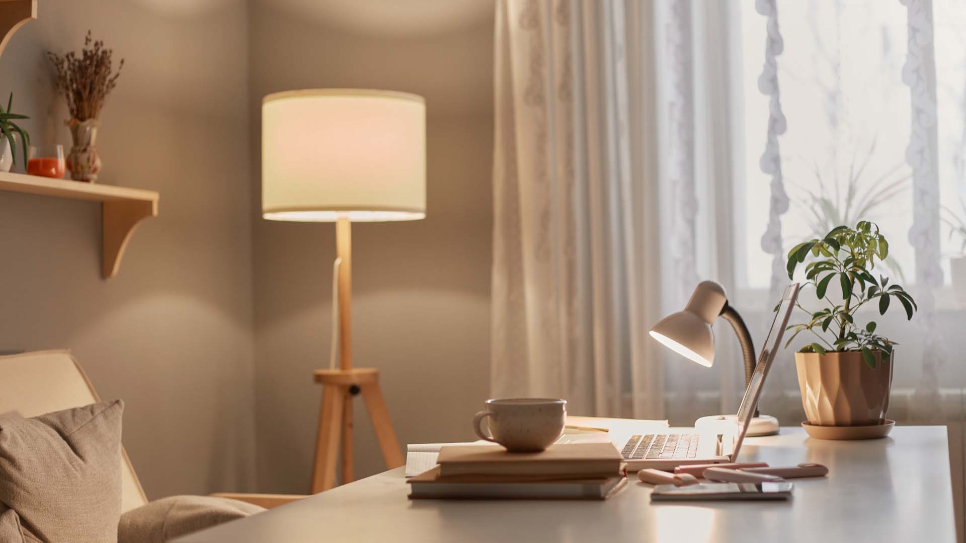 A neat study with a desk and ambient lighting