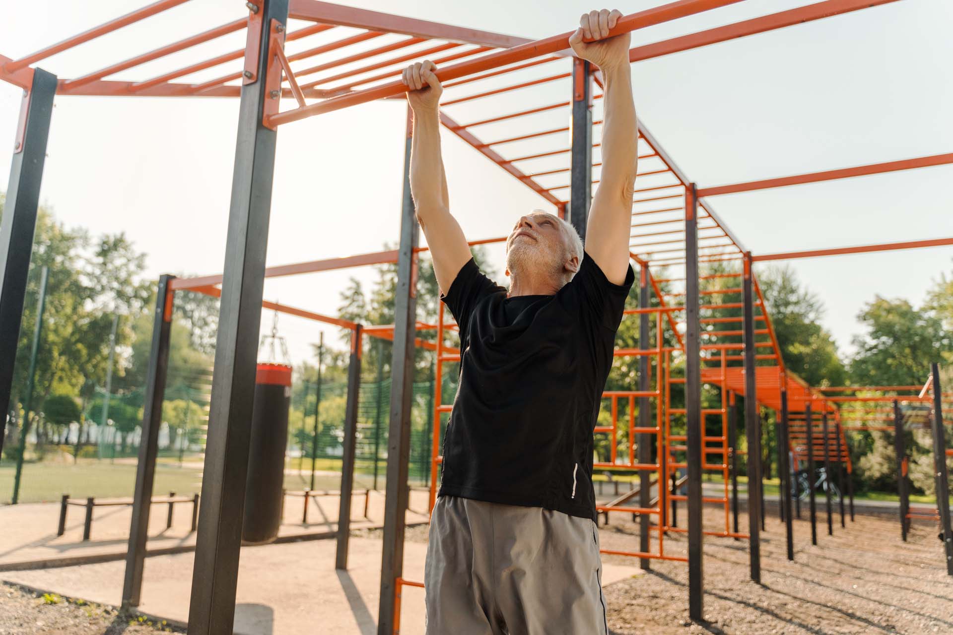 man doing standing pull up