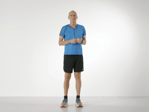 Paul standing on one leg, juggling