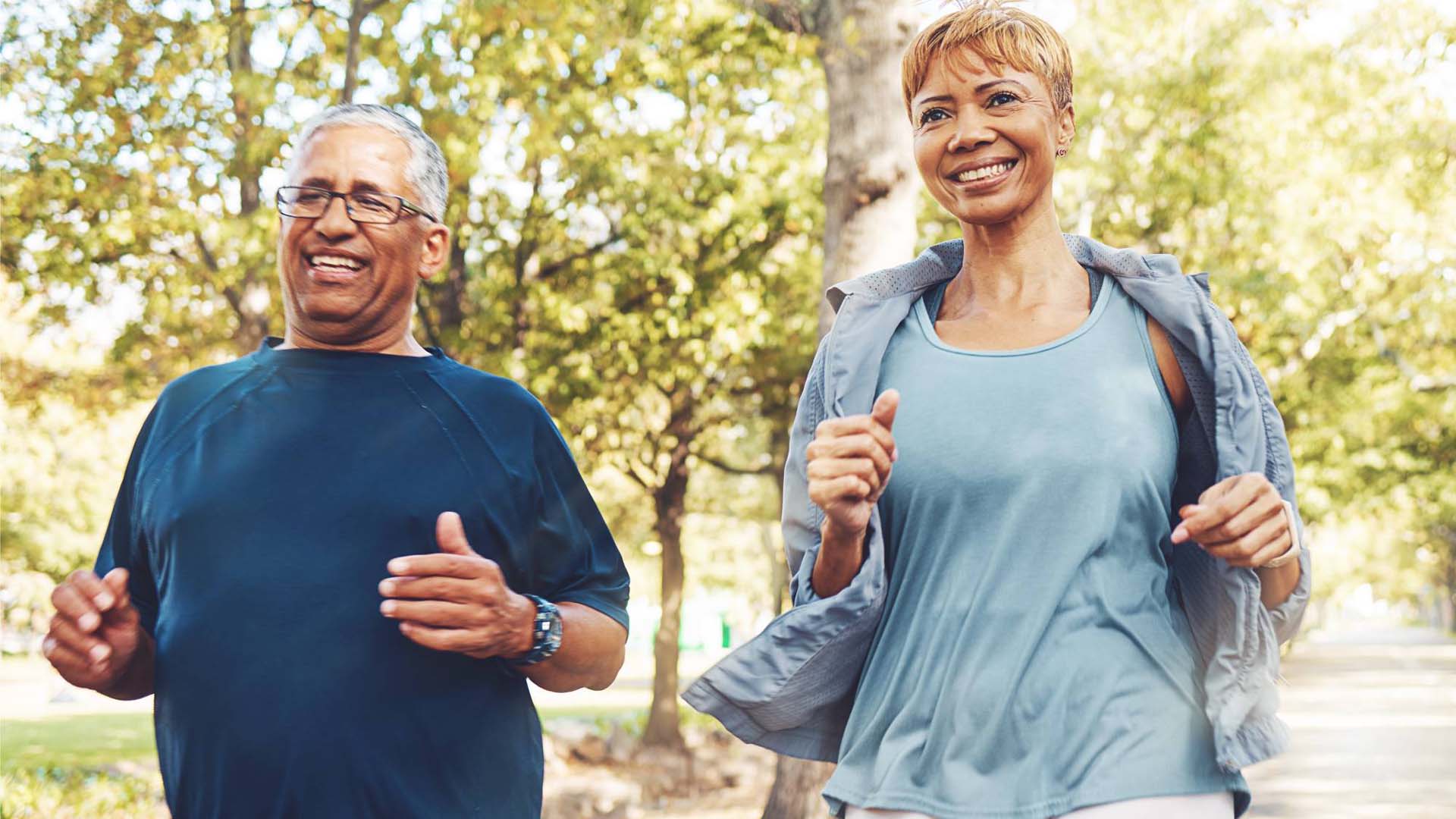 Woman and man joyfully running