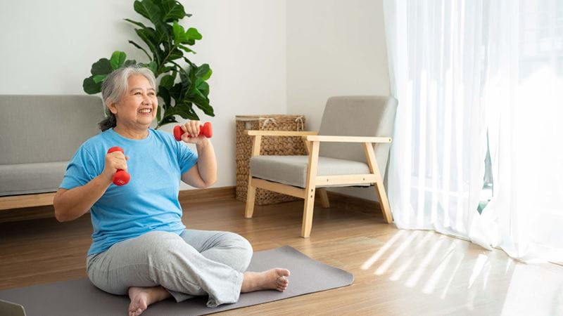 Woman exercising with dumbbells