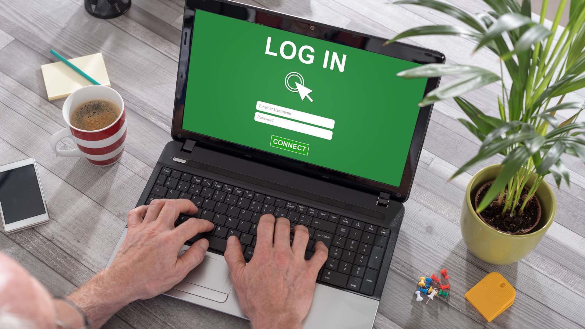 older man logging into a website
