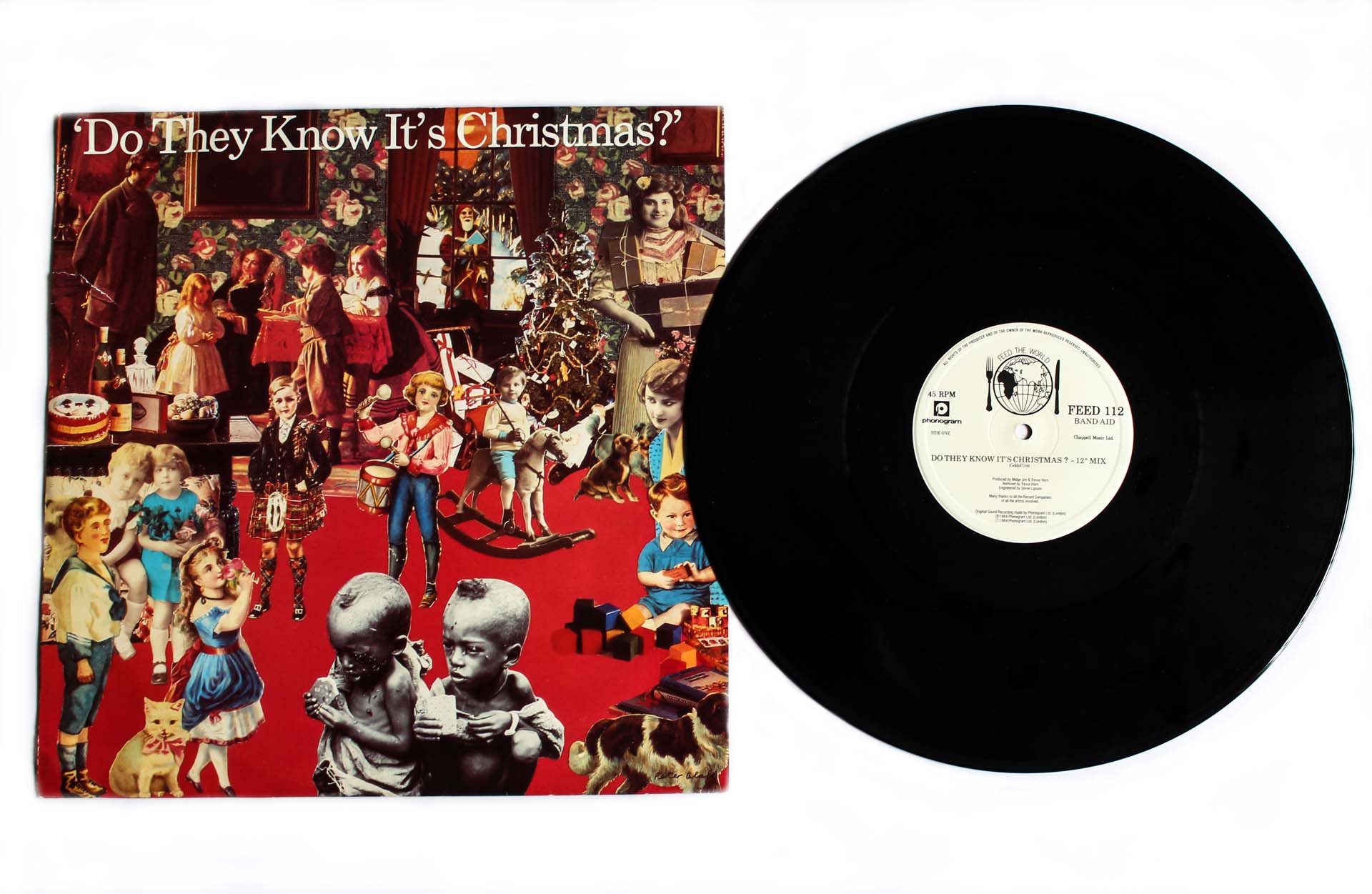 The original record cover of Band Aid's Do They Know It's Christmas, alongside the record itself