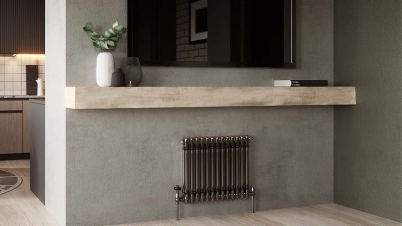 radiator with a shelf above and a big TV
