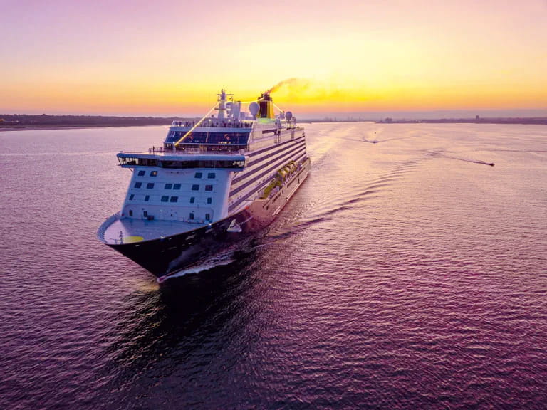 Cruise ship Spirit of Discovery on the sea at sunset