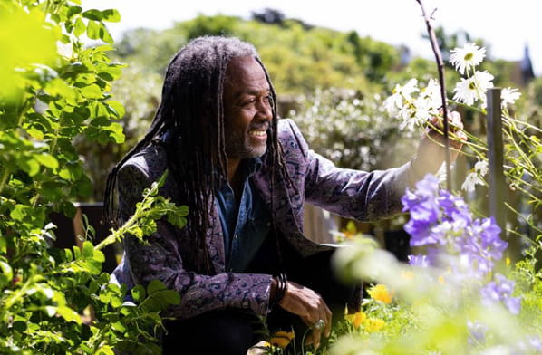 Danny Clarke in amongst garden plants