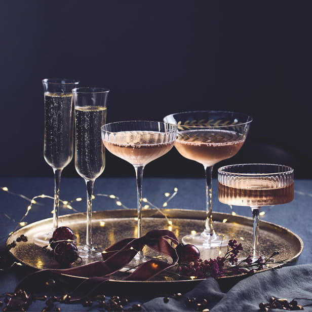 Selection of wine glasses on a gold tray