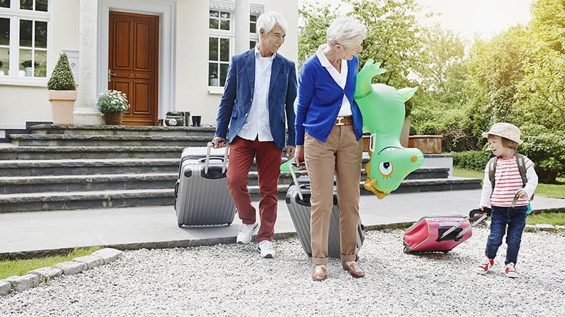 A little girl leaving home to travel with grandparents.