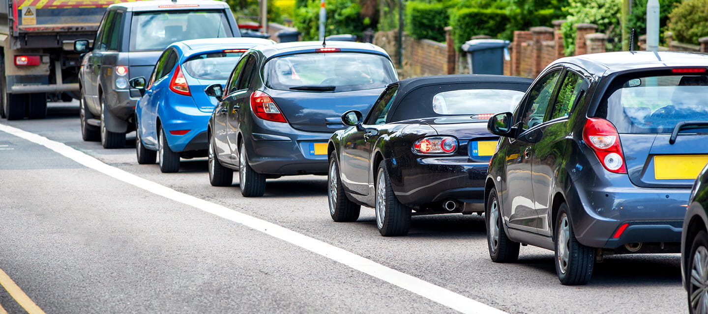 Heavy traffic jam next to a bus lane