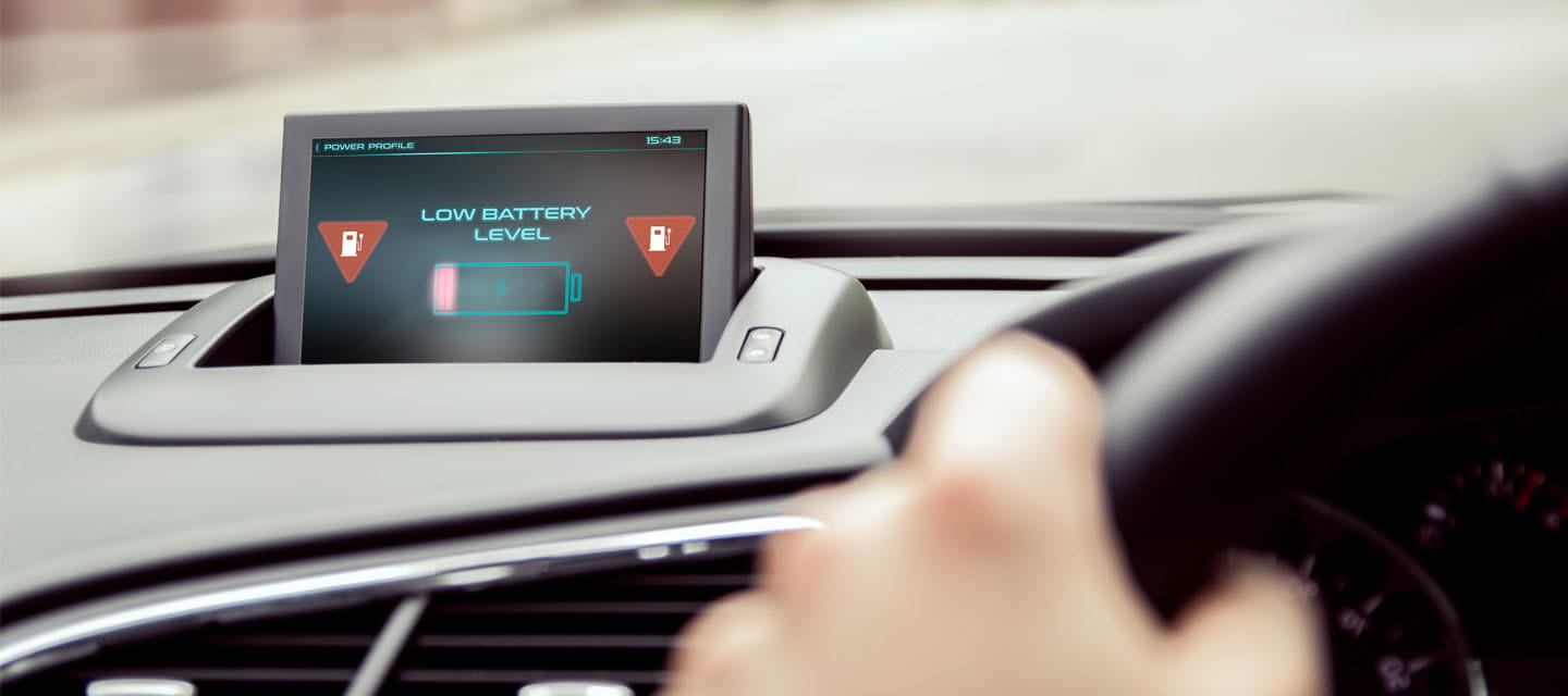 Electric car dashboard screen showing low battery