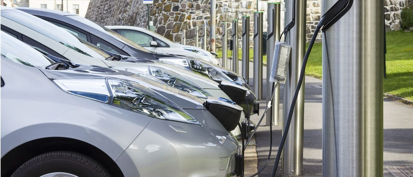 Electric cars charging on the street