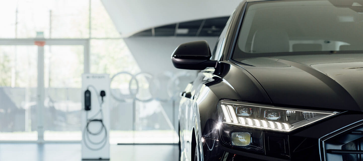 An electric car parked in a car showroom