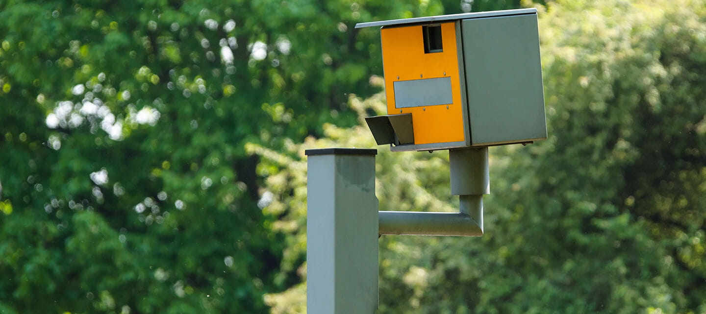 A speed camera in a leafy suburb