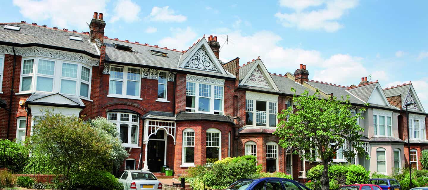 A row of desirable terraced houses on a sunny day