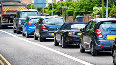 Heavy traffic jam next to a bus lane