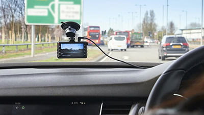 Dash cam in the windscreen of a car on it’s daily commute.