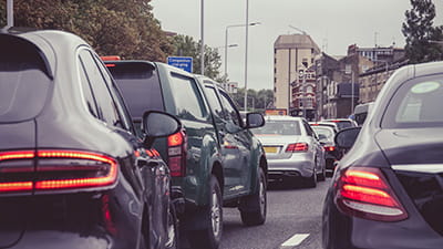 A busy road in London during rush hour