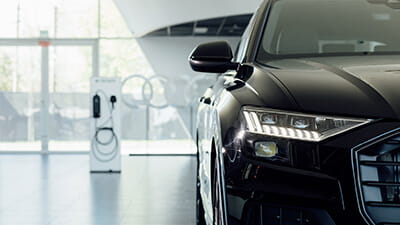 An electric car parked in a car showroom