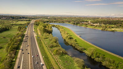 An Aerial view of a Motorway M74 facing north