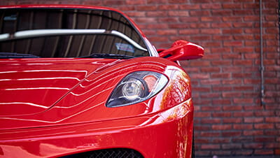 A red high performance car parked