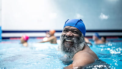 A mature man enjoying a swim